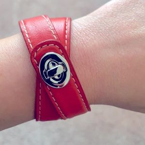 Coach coral and silver locking leather bracelet